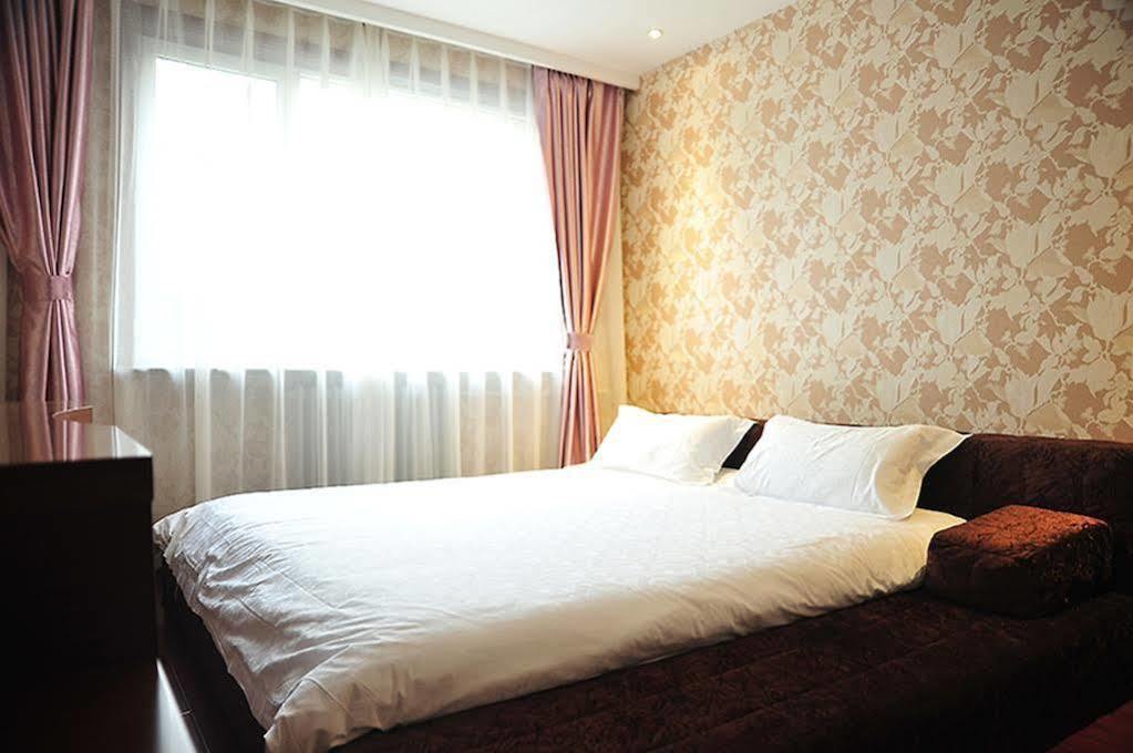 East Sacred Hotel Pechino Esterno foto